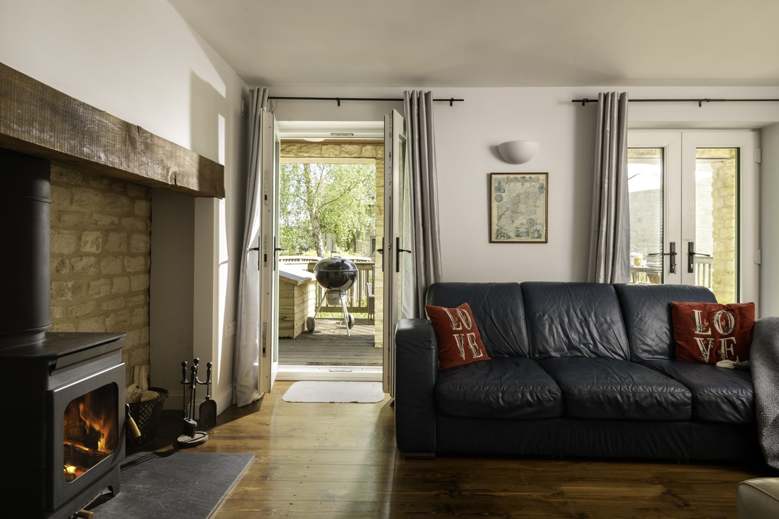 Spacious Lounge with sofas for 8 , giving onto south-facing sundeck